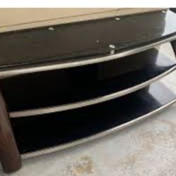 I have three pieces of furniture. And I sell the shelves every moment for $110 and the TV table for $120. ⁠