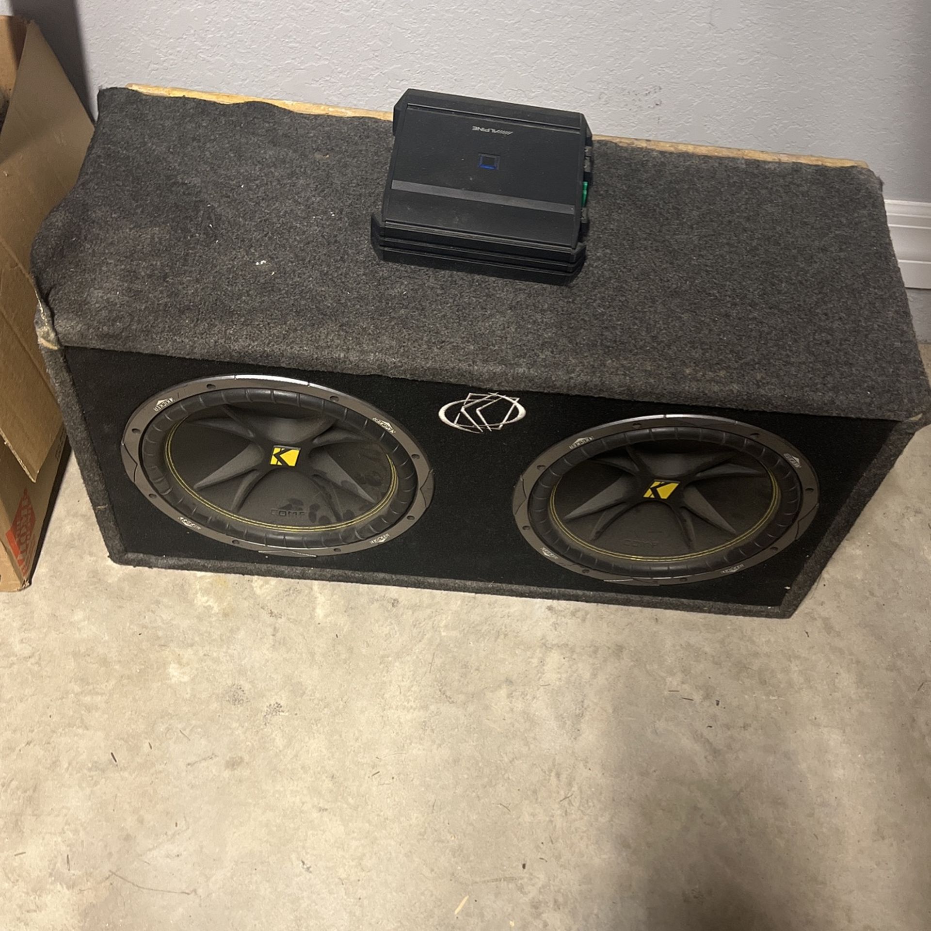 Kicker Comp 12s with Alpine Amp. 