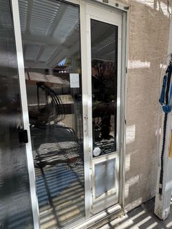 Dog door for sliding door