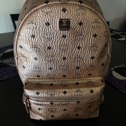 MCM rose gold backpack 