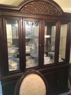 Dinning table with six chairs And china Like new its moving sale our house is sold so we sale asap and we drop the price first come first