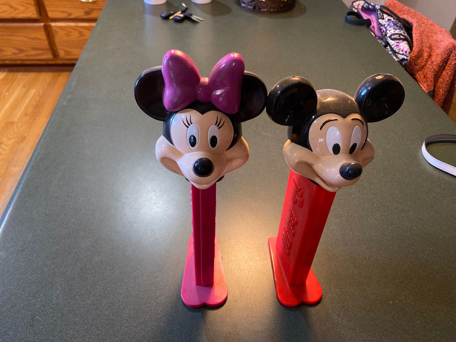 Large Disney Pez dispensers, holds full packs. Approximately 12 inches tall.