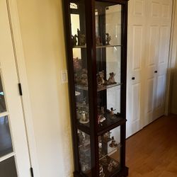 Beautiful Lighted Curio Cabinet with Miss Martha Figurine Collection 