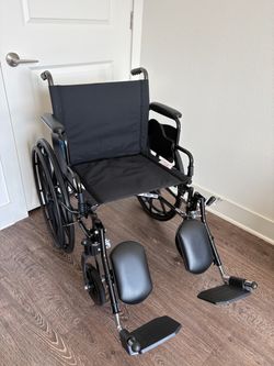 Medline Lightweight Wheelchair for Adults With Swing-Back, Desk-Length Arms, Elevating Leg Rests; 20" x 16"D Seat