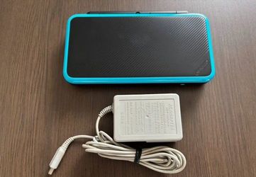 Nintendo 2ds xl with games download on it and Zelda ocarina of time