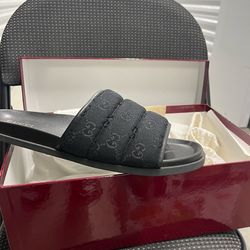 Black GUCCI slides