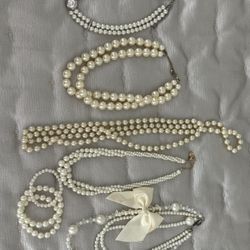 Variety of 5 Pearls necklaces, 1. 75  Year Pretty Tiara earrings n  Nicholas. 