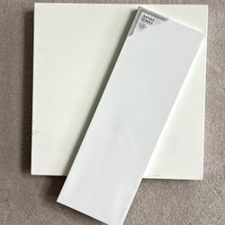 2 stretched art canvases