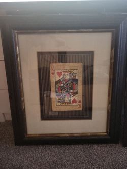 Set of 2 framed vintage playing card prints.
