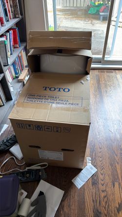 White Toto toilet one piece open box