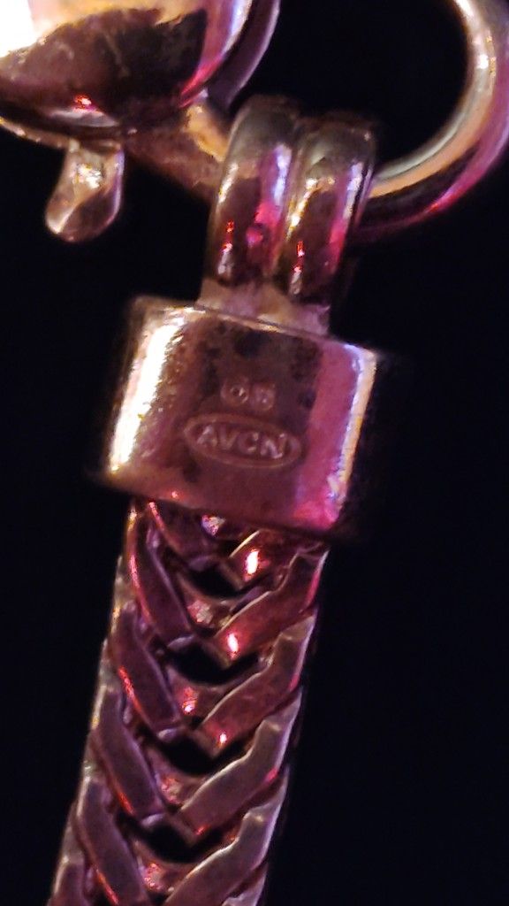 On The Bracelet It Says Os Avg Gold Bracelet