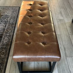 Brown bench black metal