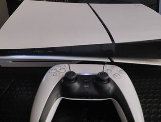 PlayStation 5 Slim Console with disc drive and DualSense Controller