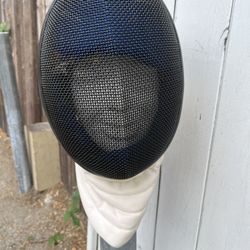 **Fencing/Epee Mask for Halloween Costume or Wall Décor**  This fencing mask, typically used in epee or other fencing disciplines, is perfect for repu