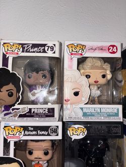 Prince and Monroe Funko pops