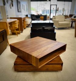 CB2 360 Rotating Walnut Coffee Table with Two Drawers