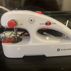 Singer Hand Held Sewing machine 