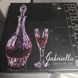 Decanter set with 4 glasses never used