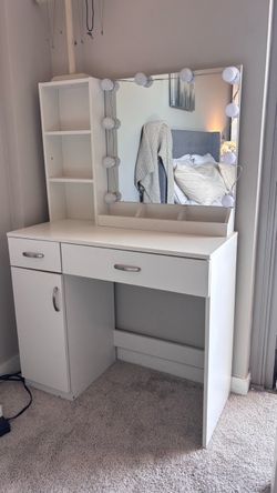 White vanity with chair