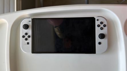 Nintendo switch OLED with dock and satisfye handle