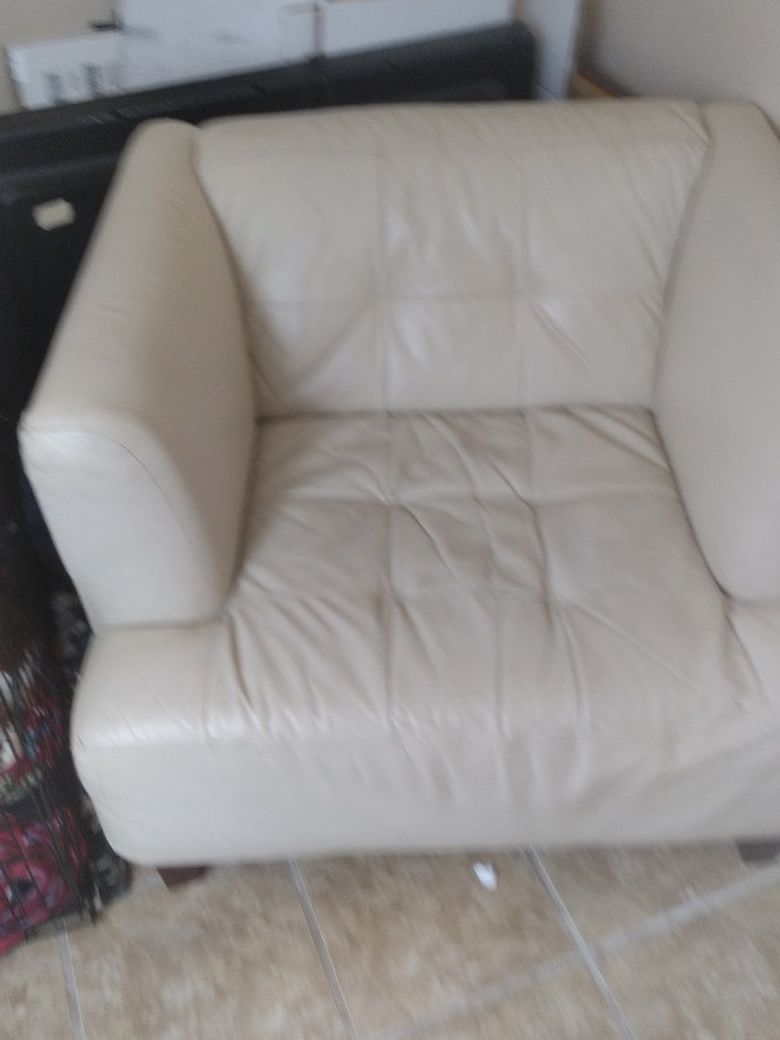 Free leather Chair and Ottoman