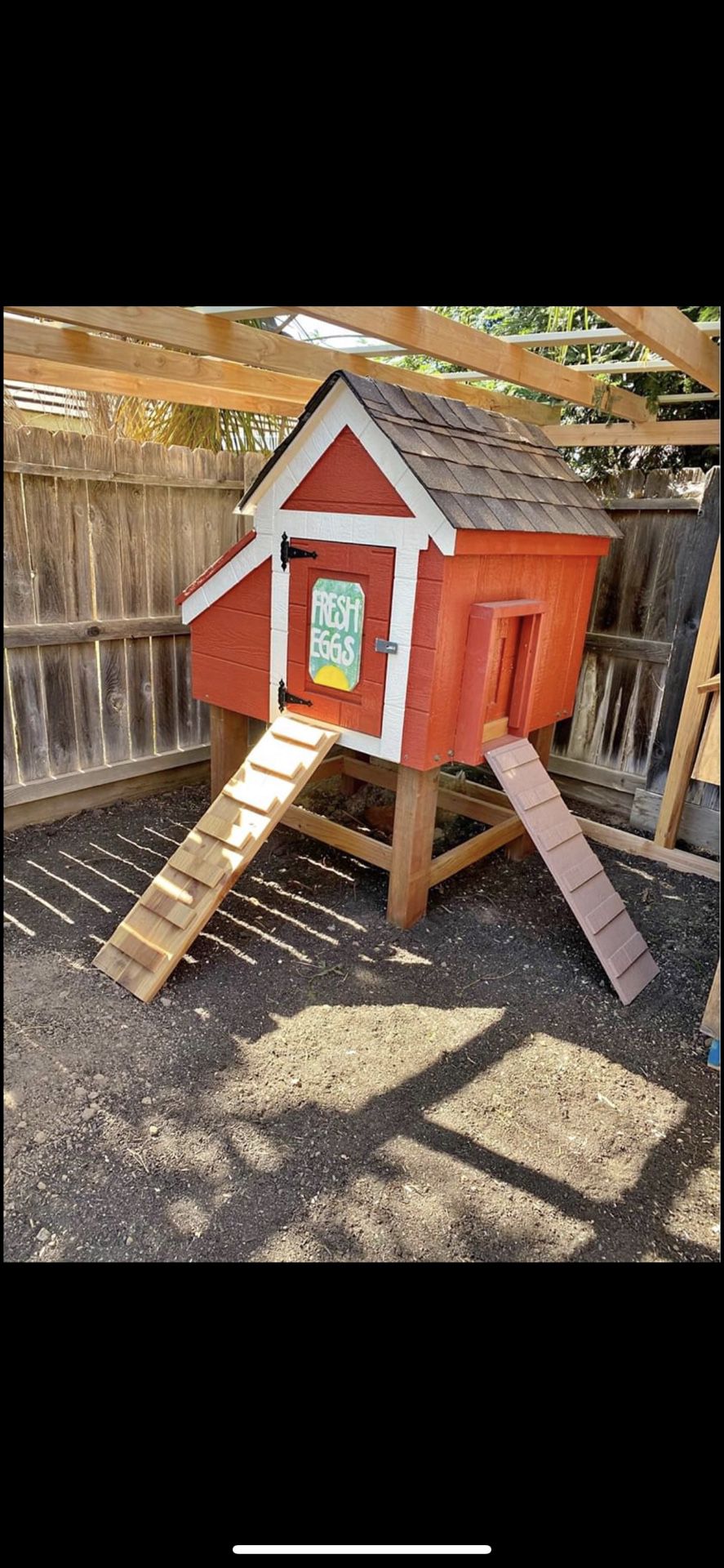 Chicken Coop 48”x45”. Will hold up to 6 chickens comfortably. Removable heat lamp attached.