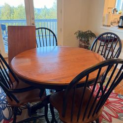 Table with leaf and four chairs