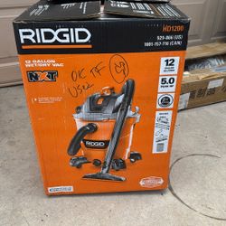 12 G RIDGID SHOP VACUUM USED