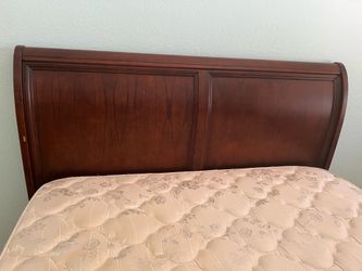 Wooden queen sleigh bed with mattress