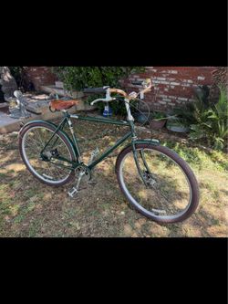 Raleigh Tourist classic city bike with a brown  leather saddle seat in great shape