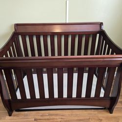 Delta 4-in-1 Crib with mattress, changing table with pad, and dresser