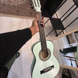 Kids guitar, preloved, and well taken care of
