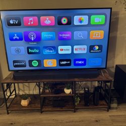 LG 65 inch 4K UHD Smart TV + Compatible TV Table - $400