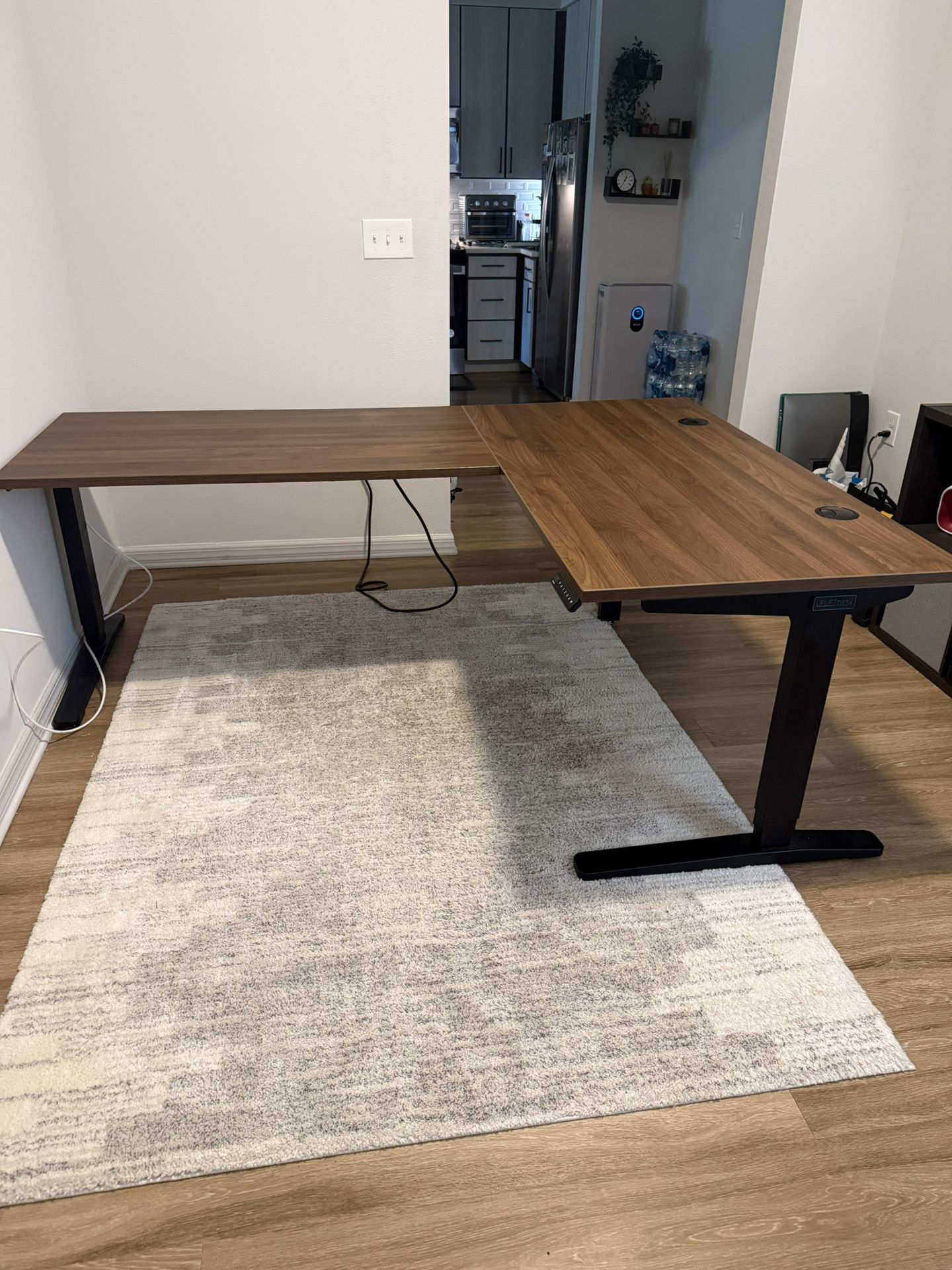 UPLIFT L-Shaped Standing Desk – 3-Leg, Walnut Laminate (60”x78”) – Excellent Condition