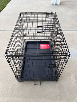 A Brand New Folding Metal Wire Dog Crate.