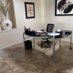 Black glass oval desk with return