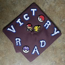 Victory Road Pokémon Graduation Cap Topper 