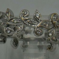 14kt white gold eternity band with diamonds 4.2 gr size 6 with 48 diamonds approximately 0.50 carat . Pre owned. 829384-2.  This is not sizable.  