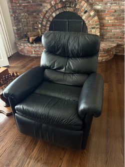 Black leather swivel recliner