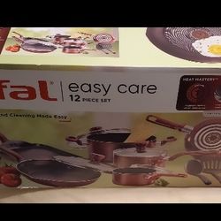 Brand New T -FAL 12 Pieces Cookware In Box Never Open Still Sealed. 