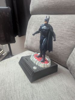 Batman and Robin statue bank