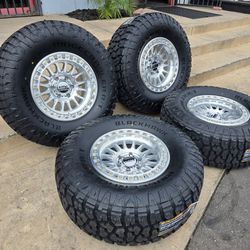 17" KMC rims w/ 35" Ridgecrawler RT tires.  $1950