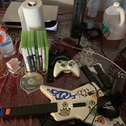 Xbox 360 w guitar & 8 games