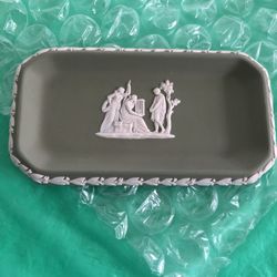 Wedgwood, England. Small dish in green stone ware with classicist scenes