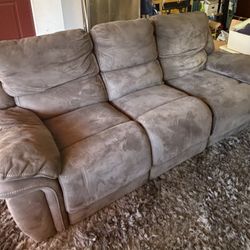 Gray faux suede sofa w/electric recline