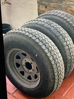 Trailer Tires on Galvanized  rim.   205/75/14.     And. 205/75/15.   65.00. Each