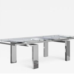 Madani Modern Furniture Glass Nablus Extension Dining Table. It extends from 71” to 106.5” with a mechanical leaf on either side.
