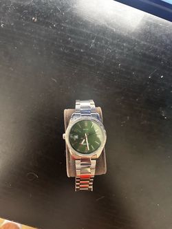 Green face Casio watch