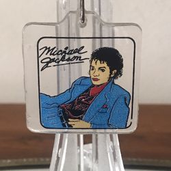 Vintage Michael Jackson Keychain with Blue and Red Design 🎙🎶 Clear Michael Jackson keychain featuring a blue and red design 🎤