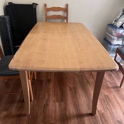 Dining table with leaf extension and 4 chairs